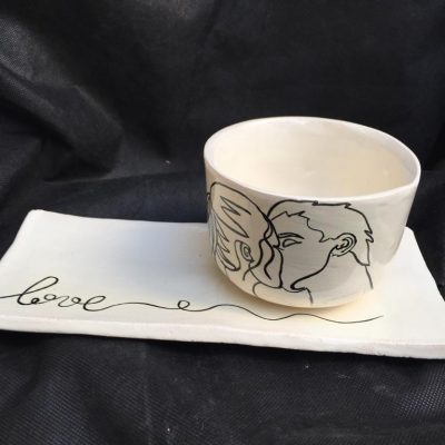 Conjunto taza y plato pareja beso